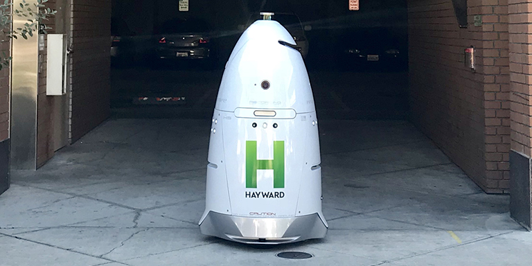 A cone-shapped robot with the word Hayward on it