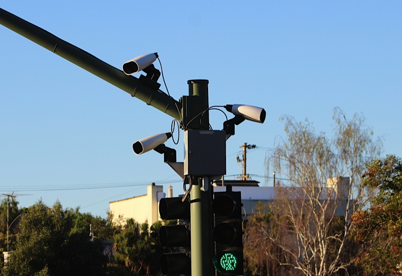 Three cameras attached to a traffic signal