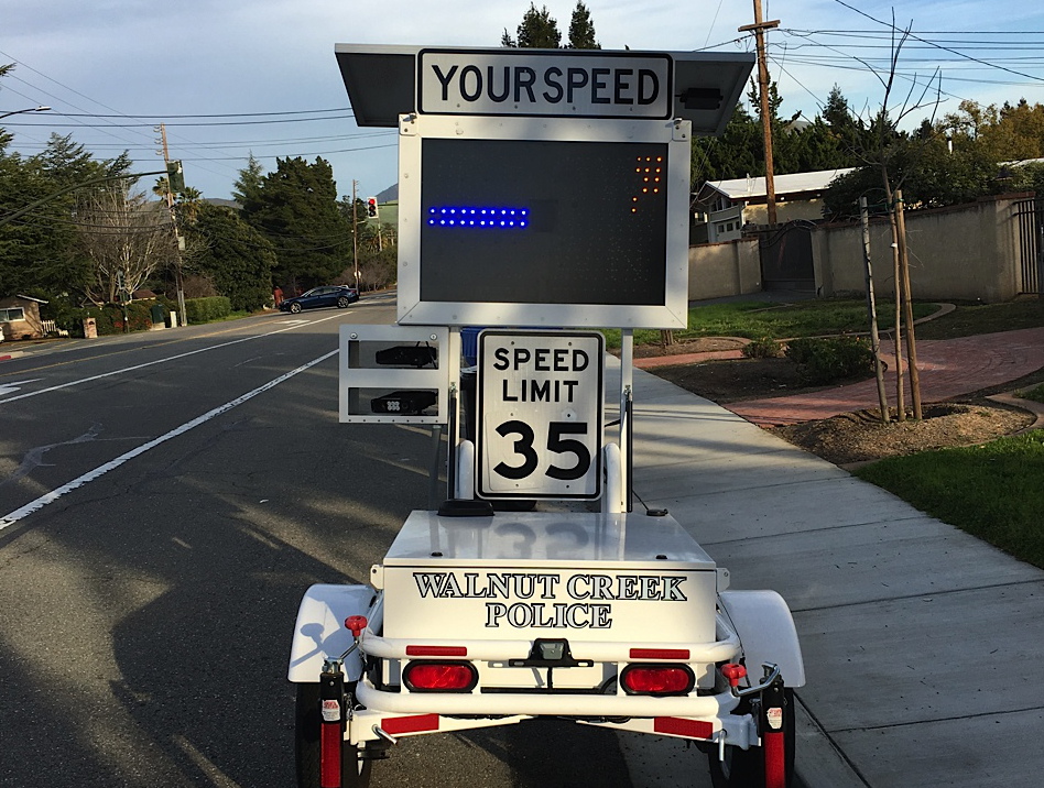A Walnut Creek Police Department speed trailer with an automated license plate reader attached.