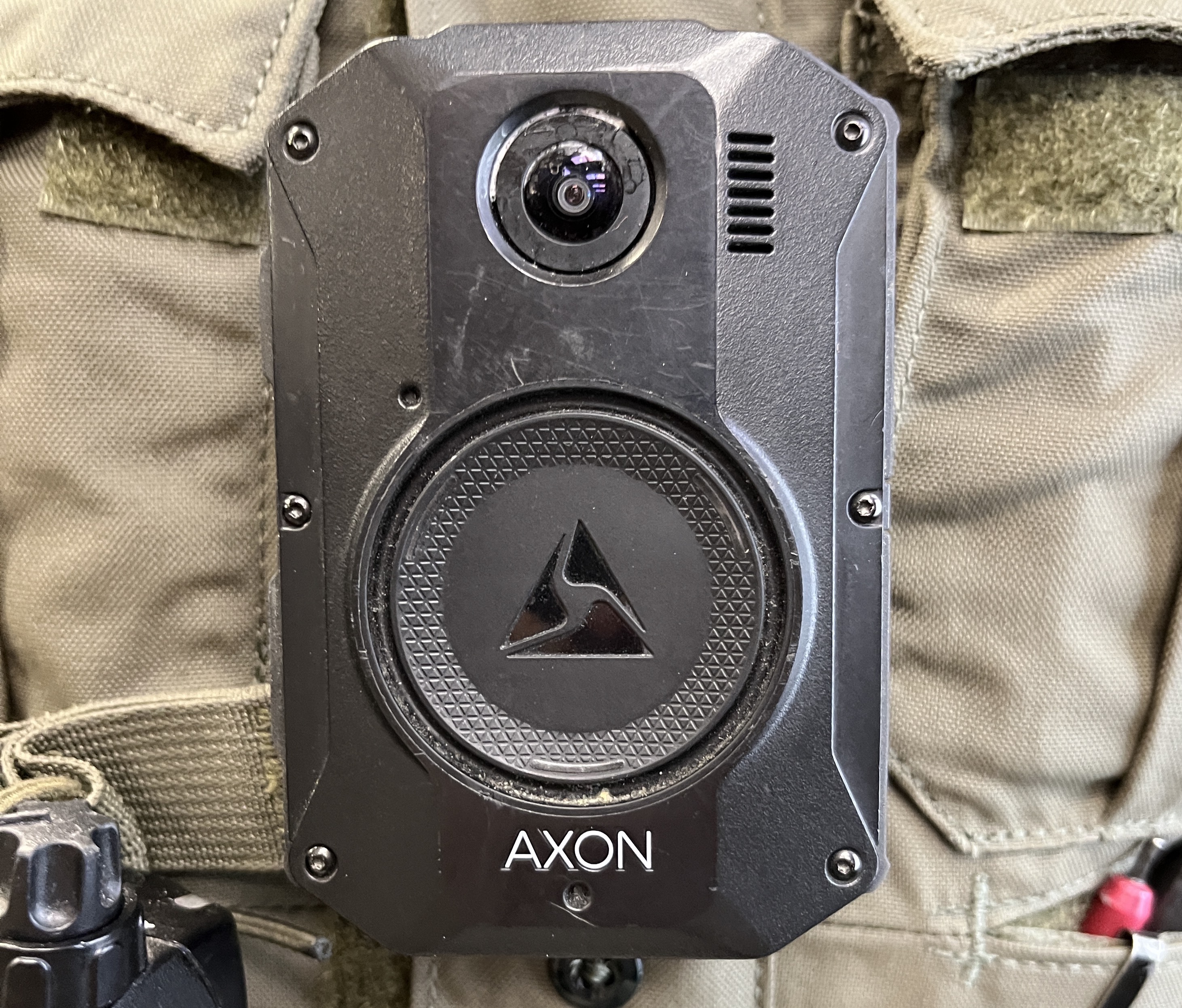 A close-up of an Axon body-worn camera